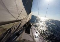 sailing yacht sailing to horizon sailboat bow mast sail